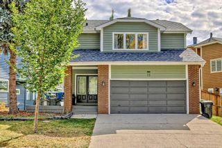 Photo 1: 12 Stradwick Way SW in Calgary: Strathcona Park Detached for sale : MLS®# A2080539