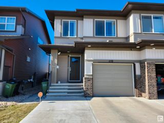 Photo 1: 410 Crystallina Nera Drive in Edmonton: Zone 28 House Half Duplex for sale : MLS®# E4383583