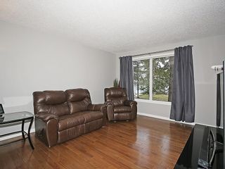 Photo 13: 121 999 CANYON MEADOWS Drive SW in Calgary: Canyon Meadows House for sale : MLS®# C4113761