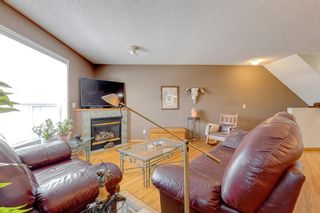 Photo 7: 59 Mt Aberdeen Manor SE in Calgary: McKenzie Lake Row/Townhouse for sale : MLS®# A2020809