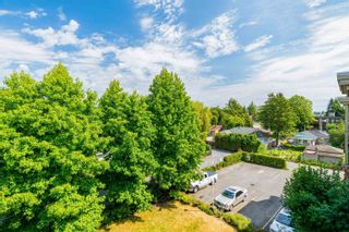 Photo 33: 301 20257 54 Avenue in Langley: Langley City Condo for sale in "OXFORD COURT" : MLS®# R2716478