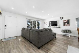 Photo 2: 227 Queensland Circle SE in Calgary: Queensland Detached for sale : MLS®# A2112688