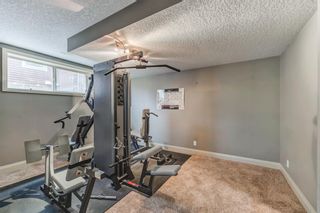Photo 32: 320 Kinniburgh Boulevard: Chestermere Detached for sale : MLS®# A2054150