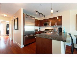 Photo 4: 221 676 W 6TH Avenue in Vancouver: Fairview VW Townhouse for sale in "BOHEMIA" (Vancouver West)  : MLS®# V817357