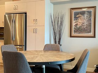 Photo 1: 206 130 Auburn Meadows View SE in Calgary: Auburn Bay Apartment for sale : MLS®# A2042200