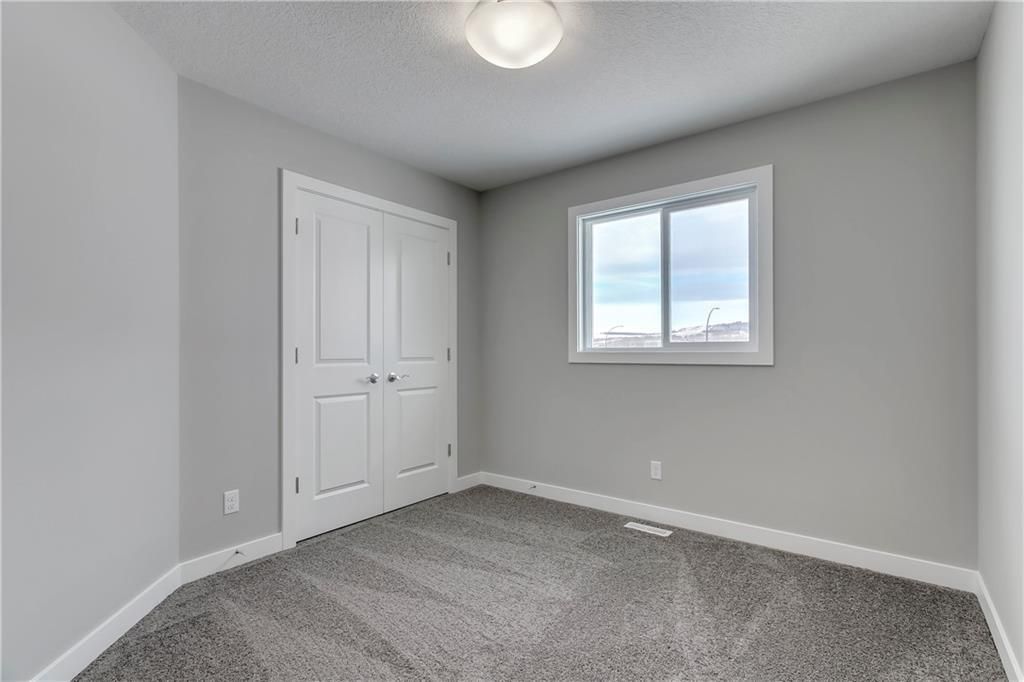 Photo 33: Photos: 56 Creekside Green SW in Calgary: C-168 Detached for sale : MLS®# C4286836