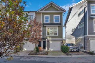 Photo 1: 11 21150 76A Avenue in Langley: Willoughby Heights Townhouse for sale in "Hutton" : MLS®# R2833396