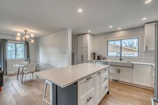 Photo 13: 227 Windermere Road SW in Calgary: Wildwood Detached for sale : MLS®# A1218903