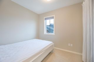 Photo 32: 103 Ascot Point SW in Calgary: Aspen Woods Row/Townhouse for sale : MLS®# A1183911
