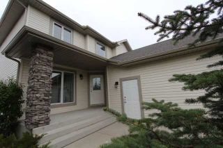 Photo 2: 180 FAIRWAYS Drive NW: Airdrie Residential Detached Single Family for sale : MLS®# C3526868