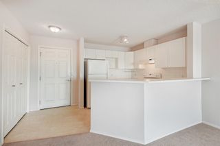 Photo 9: 1304 950 Arbour Lake Road NW in Calgary: Arbour Lake Apartment for sale : MLS®# A2054654