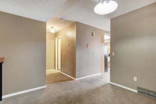 Photo 8: 69 Glamis Gardens SW in Calgary: Glamorgan Row/Townhouse for sale : MLS®# A2006286