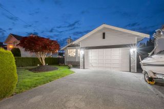 Photo 1: 18863 FORD Road in Pitt Meadows: Central Meadows House for sale : MLS®# R2579235