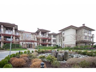Photo 1: 208 16421 64 Avenue in Surrey: Cloverdale BC Condo for sale in "St. Andrews at Northview" (Cloverdale)  : MLS®# R2041452