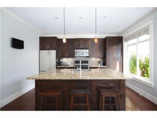 Photo 9: 428 E 34TH Avenue in Vancouver: Fraser VE House for sale in "Main Street" (Vancouver East)  : MLS®# V1026641