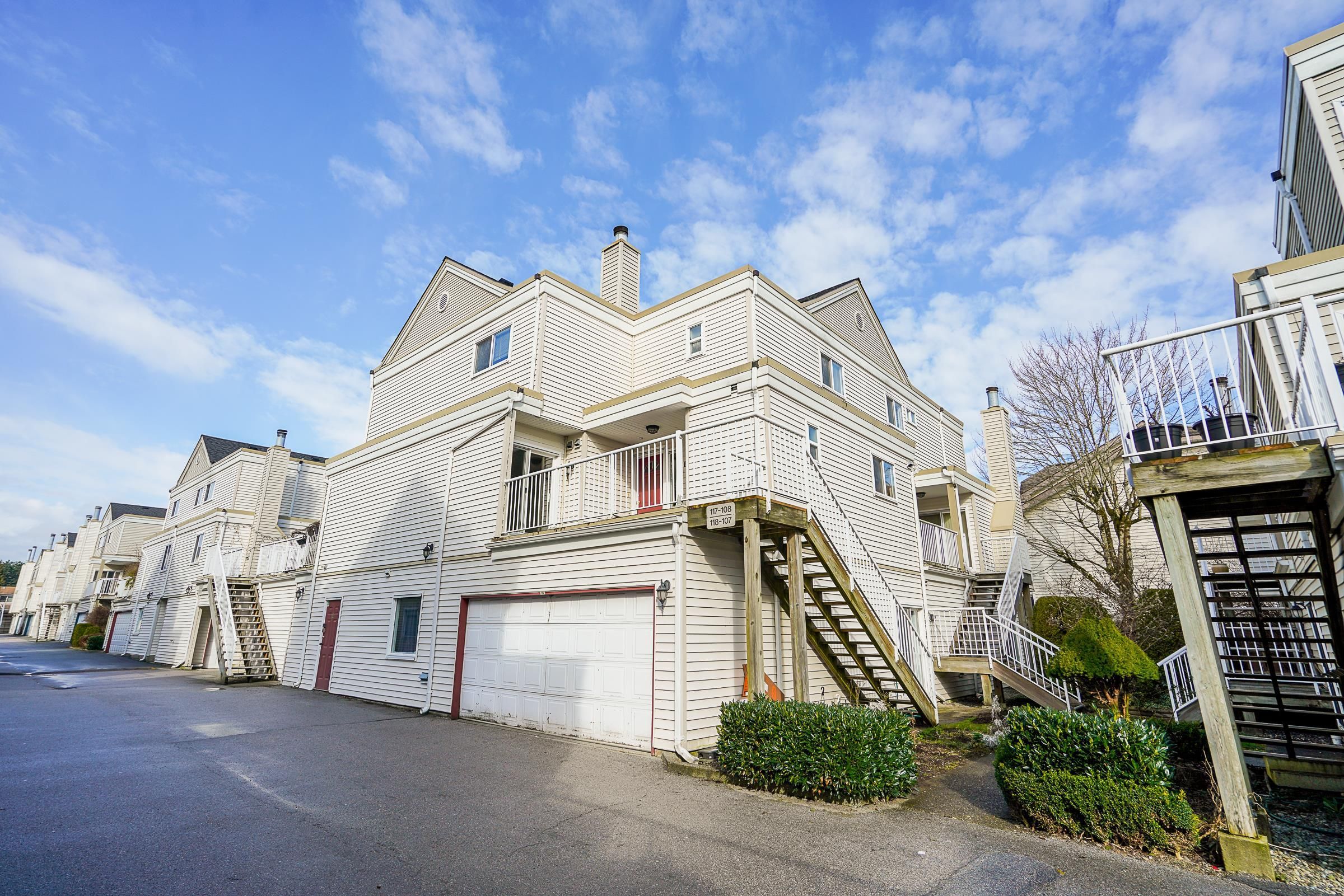 Main Photo: 118 10091 156 Street in Surrey: Guildford Townhouse for sale in "Guildford Park" (North Surrey)  : MLS®# R2695290