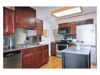 Photo 3: 97 12099 237TH Street in Maple Ridge: East Central Townhouse for sale in "THE GABRIOLA" : MLS®# V843157