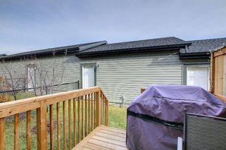 Photo 37: 27 Clydesdale Crescent: Cochrane Row/Townhouse for sale : MLS®# A1157049