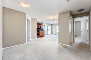 Photo 4: 1318 16969 24 Street SW in Calgary: Bridlewood Condo for sale : MLS®# C4119974