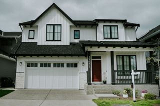Photo 1: 19622 73C Avenue in Langley: Willoughby Heights House for sale in "West Latimer" : MLS®# R2776812