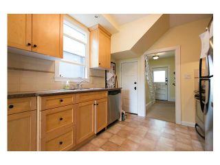 Photo 9: 543 E 21ST Avenue in Vancouver: Fraser VE House for sale in "CEDAR COTTAGE" (Vancouver East)  : MLS®# V1062465