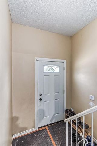 Photo 5: 205 Pineset Place NE in Calgary: Pineridge Semi Detached (Half Duplex) for sale : MLS®# A2052172