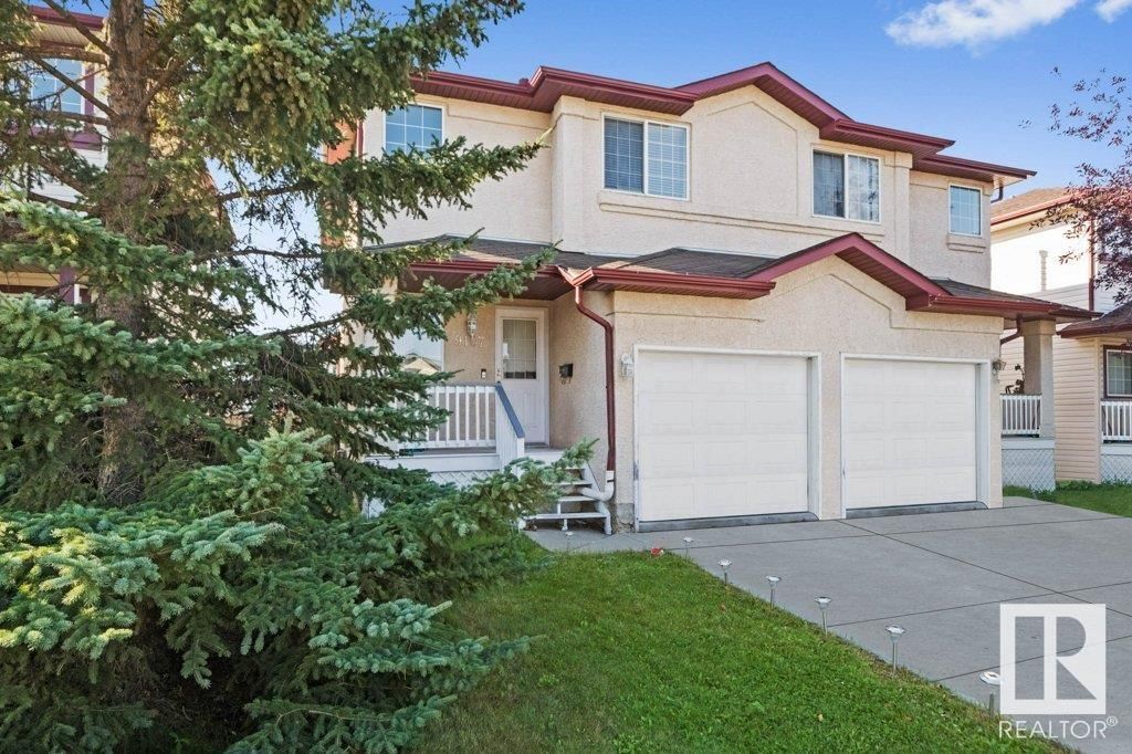 Main Photo: 9107 165 Avenue in Edmonton: Zone 28 House Half Duplex for sale : MLS®# E4358709