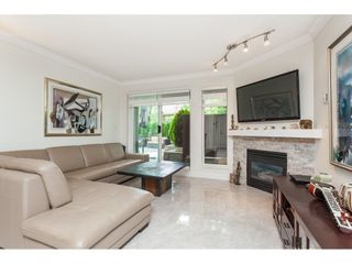 Photo 4: 103 6385 121 Street in Surrey: Panorama Ridge Condo for sale in "BOUNDARY PARK PLACE" : MLS®# R2391175