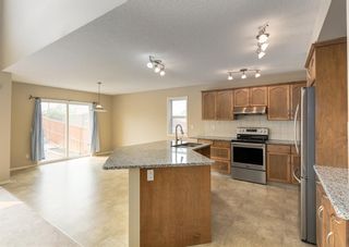 Photo 4: 148 Cougartown Close SW in Calgary: Cougar Ridge Detached for sale : MLS®# A2050763