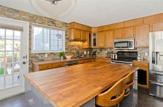Photo 13: 367 WOODBINE Boulevard SW in Calgary: Woodbine House for sale : MLS®# C4130144
