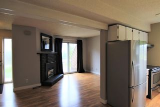 Photo 2: 26 4940 39 Avenue SW in Calgary: Glenbrook Row/Townhouse for sale : MLS®# C4302811