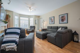 Photo 10: 201 20680 56 Avenue in Langley: Langley City Condo for sale in "Cassola Court" : MLS®# R2800441