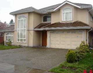 Photo 1: 8025 124TH ST in Surrey: Queen Mary Park Surrey House for sale : MLS®# F2607185