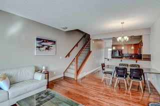 Photo 15: 4 156 Rockyledge View NW in Calgary: Rocky Ridge Row/Townhouse for sale : MLS®# A2120202