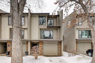 Photo 1: 3837 Point Mckay Road NW in Calgary: Point McKay Row/Townhouse for sale : MLS®# A1163612