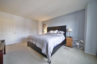 Photo 26: 10 388 Sandarac Drive NW in Calgary: Sandstone Valley Row/Townhouse for sale : MLS®# A1181075