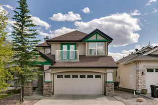 Photo 1: 118 Everwillow Close SW in Calgary: Evergreen Detached for sale : MLS®# A2053821