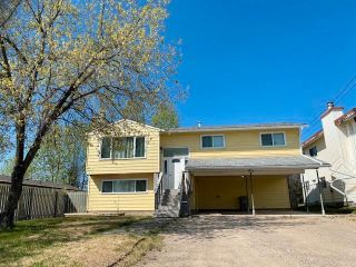 Photo 1: 5015 44 Street in Fort Nelson: Fort Nelson -Town House for sale : MLS®# R2733410