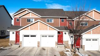 Photo 1: 214 Pantego Lane NW in Calgary: Panorama Hills Row/Townhouse for sale : MLS®# A1188181