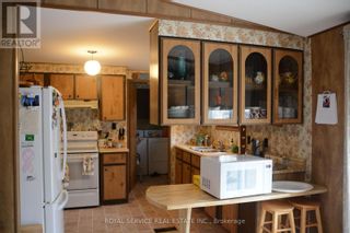 Photo 10: 1087 SEVENTH LANE in Minden Hills: House for sale : MLS®# X8221062