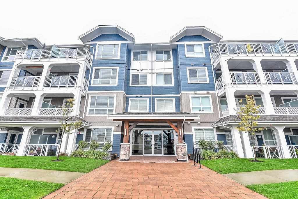 Main Photo: 201 16396 64 Avenue in Surrey: Cloverdale BC Condo for sale in "The Ridge at Bose Farm" (Cloverdale)  : MLS®# R2132431
