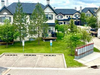 Photo 3: 384 Rockyspring Grove NW in Calgary: Rocky Ridge Row/Townhouse for sale : MLS®# A1231276