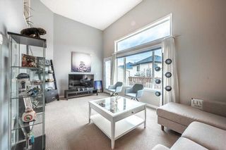 Photo 5: 167 Everhollow Heights SW in Calgary: Evergreen Row/Townhouse for sale : MLS®# A2088855