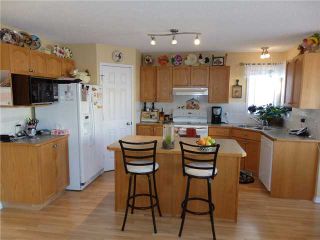 Photo 4: 159 FAIRWAYS Close NW: Airdrie Residential Detached Single Family for sale : MLS®# C3602387