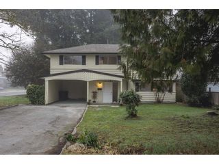 Photo 1: 3709 CEDAR Drive in Port Coquitlam: Lincoln Park PQ House for sale : MLS®# R2646400