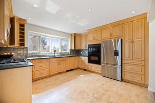 Photo 12: 79 Wood Crescent SW in Calgary: Woodlands Detached for sale : MLS®# A2122281
