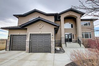Photo 2: 167 COVE Close: Chestermere Detached for sale : MLS®# A1090324
