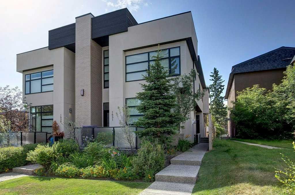 Main Photo: 2 1531 28 Avenue SW in Calgary: South Calgary Row/Townhouse for sale : MLS®# A2095719