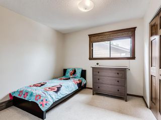 Photo 32: 227 COACH SIDE Road SW in Calgary: Coach Hill Detached for sale : MLS®# A1043295