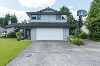 Photo 1: 19864 48A Avenue in Langley: Langley City House for sale in "Mason Heights Area" : MLS®# R2086596